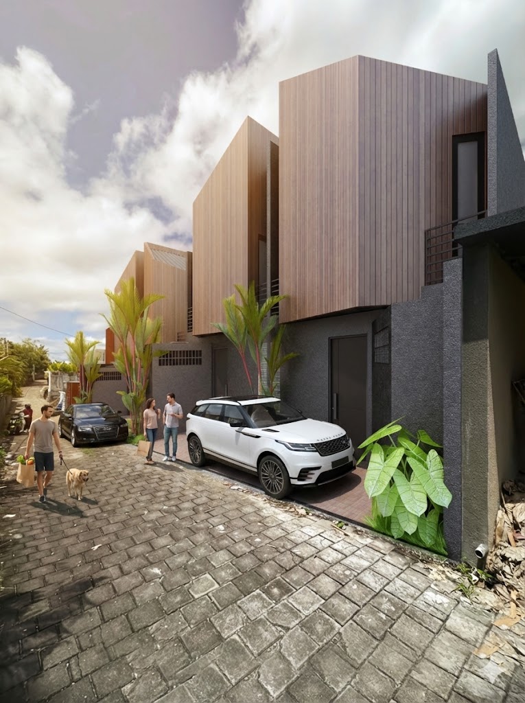 Quiet residential lane in Pererenan, Bali with the villa's wooden facade